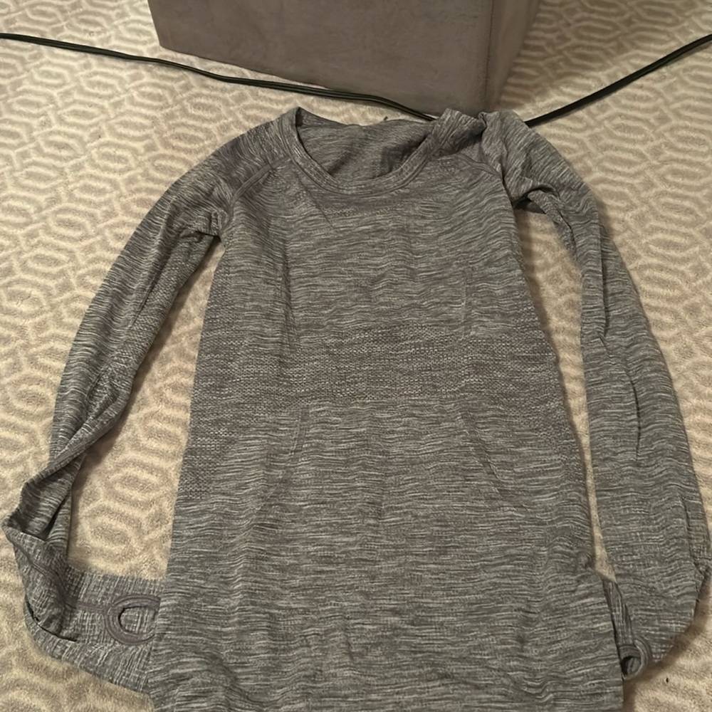 Size 4. Long sleeve gray lulu lemon shirt